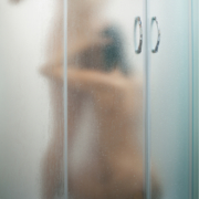 Wife kneeling before husband in the shower ~ MarriageHeat